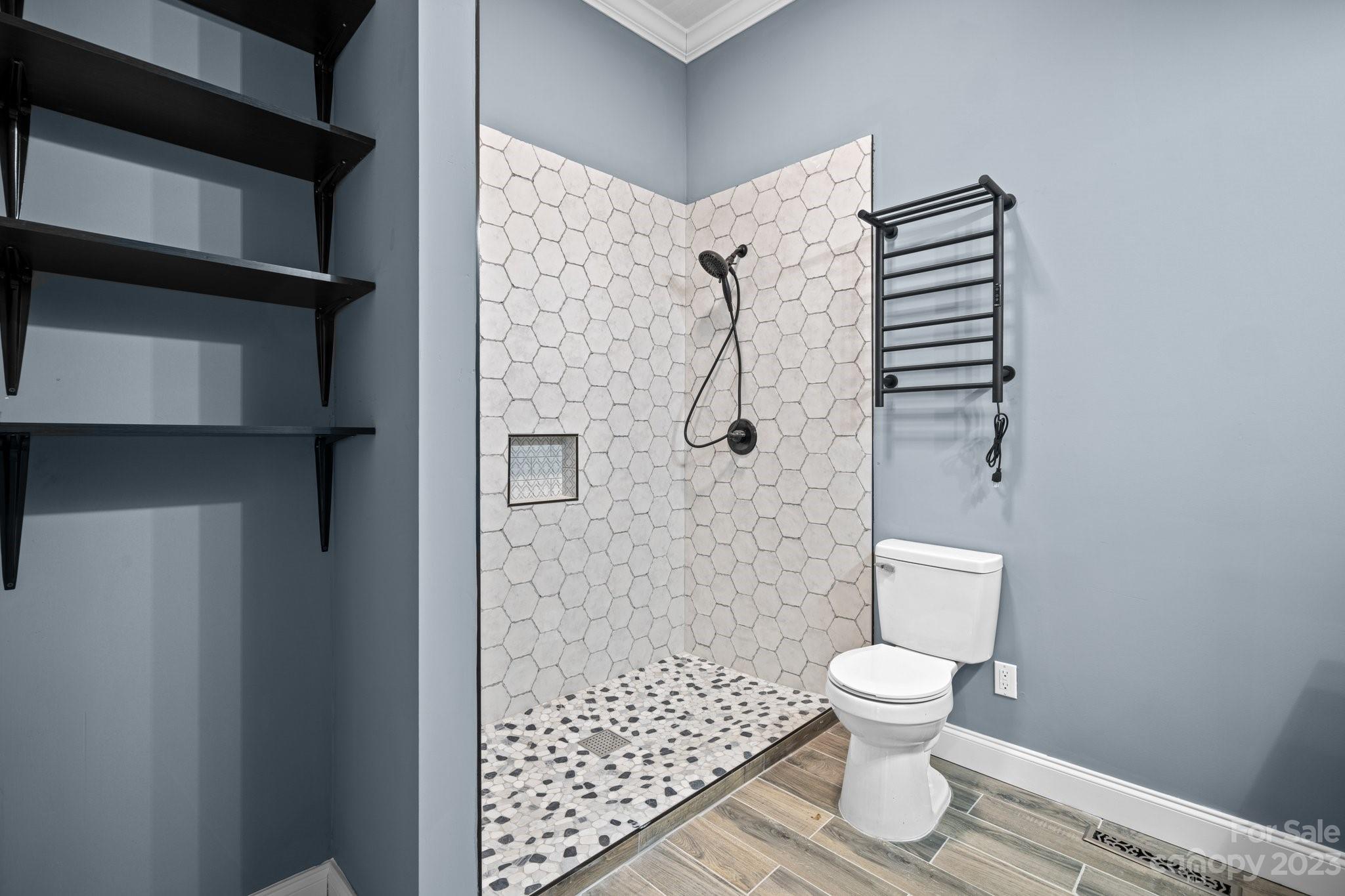 403 2nd Street Southeast Conover, NC 28613 - Photo 24 of 35 a white toilet sitting next to a bathroom sink