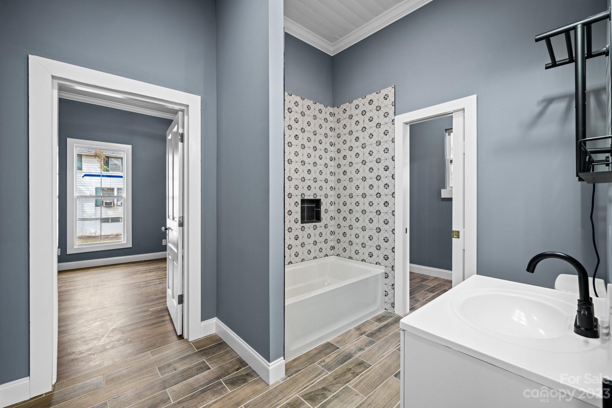403 2nd Street Southeast Conover, NC 28613 - Photo 28 of 35 a bathroom with a sink and a bathtub