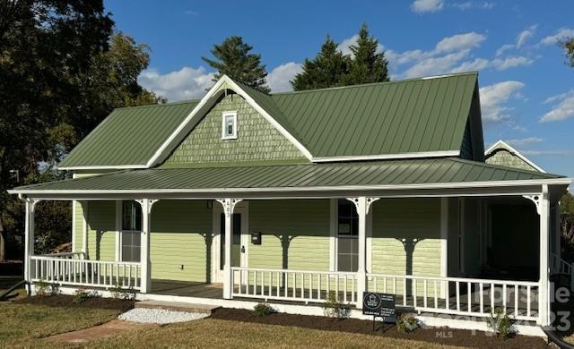 403 2nd Street Southeast Conover, NC 28613 - Photo 35 of 35 front view of a house with a iron gate