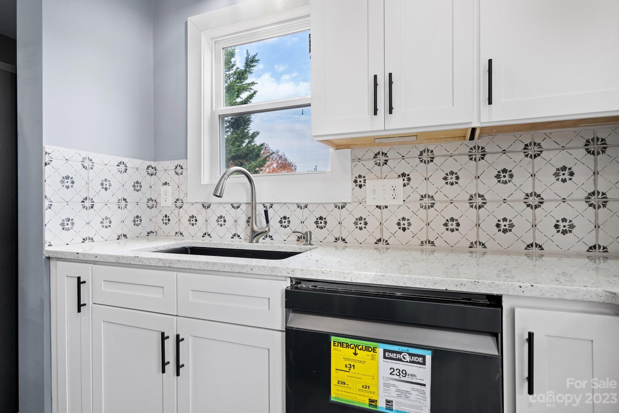 403 2nd Street Southeast Conover, NC 28613 - Photo 8 of 35 a bathroom with a sink and a mirror