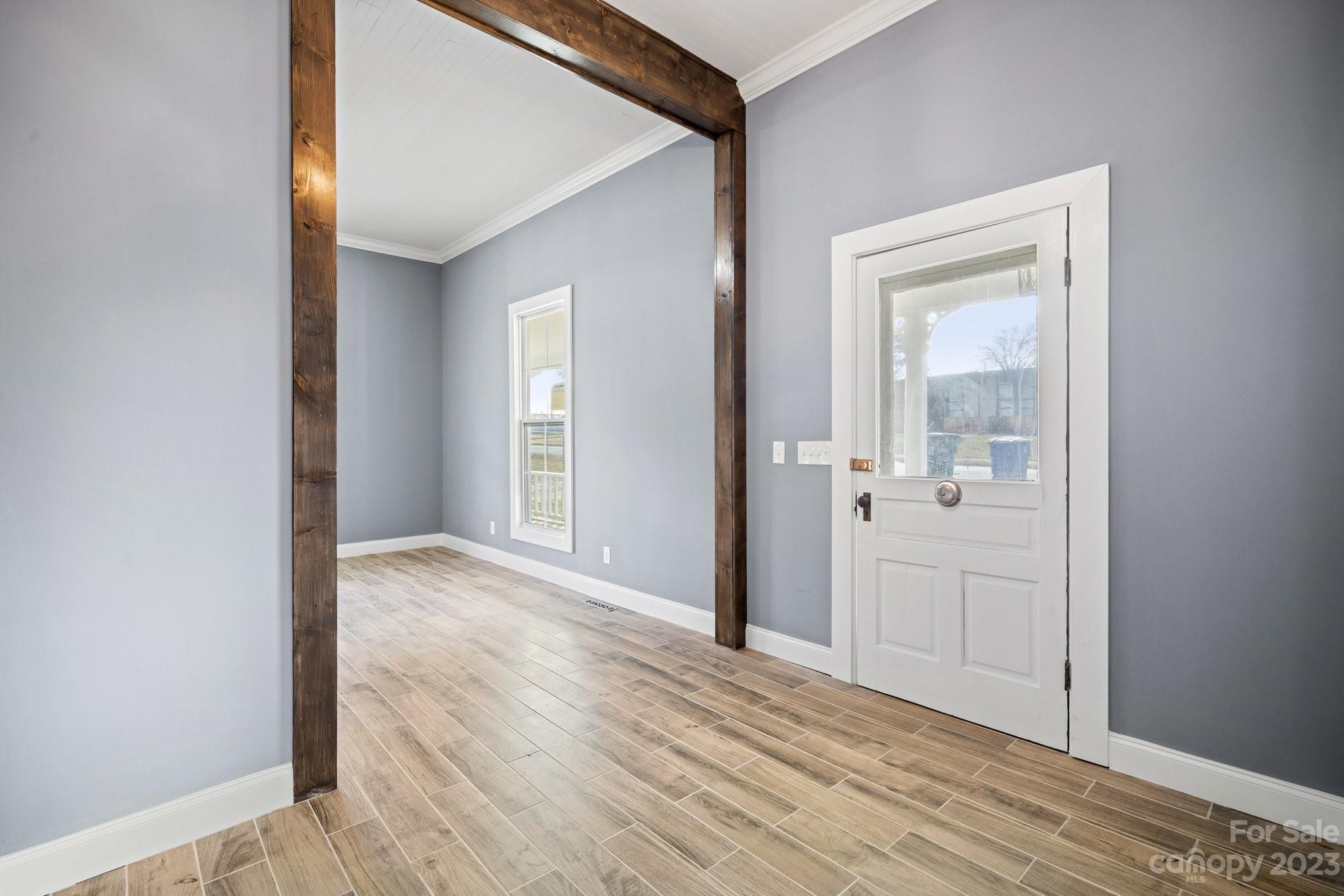 403 2nd Street Southeast Conover, NC 28613 - Photo 10 of 35 a view of a hallway with wooden floor
