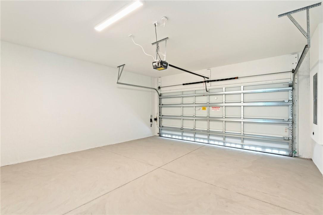 5653 Stradella Drive Boca Raton, FL 33433 - Photo 13 of 26 a view of a garage with stairs
