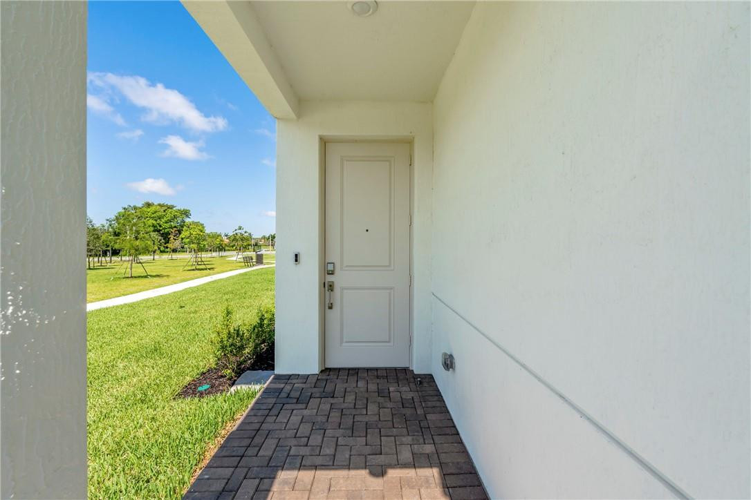 5653 Stradella Drive Boca Raton, FL 33433 - Photo 4 of 26 a view of bathroom with shower and garden