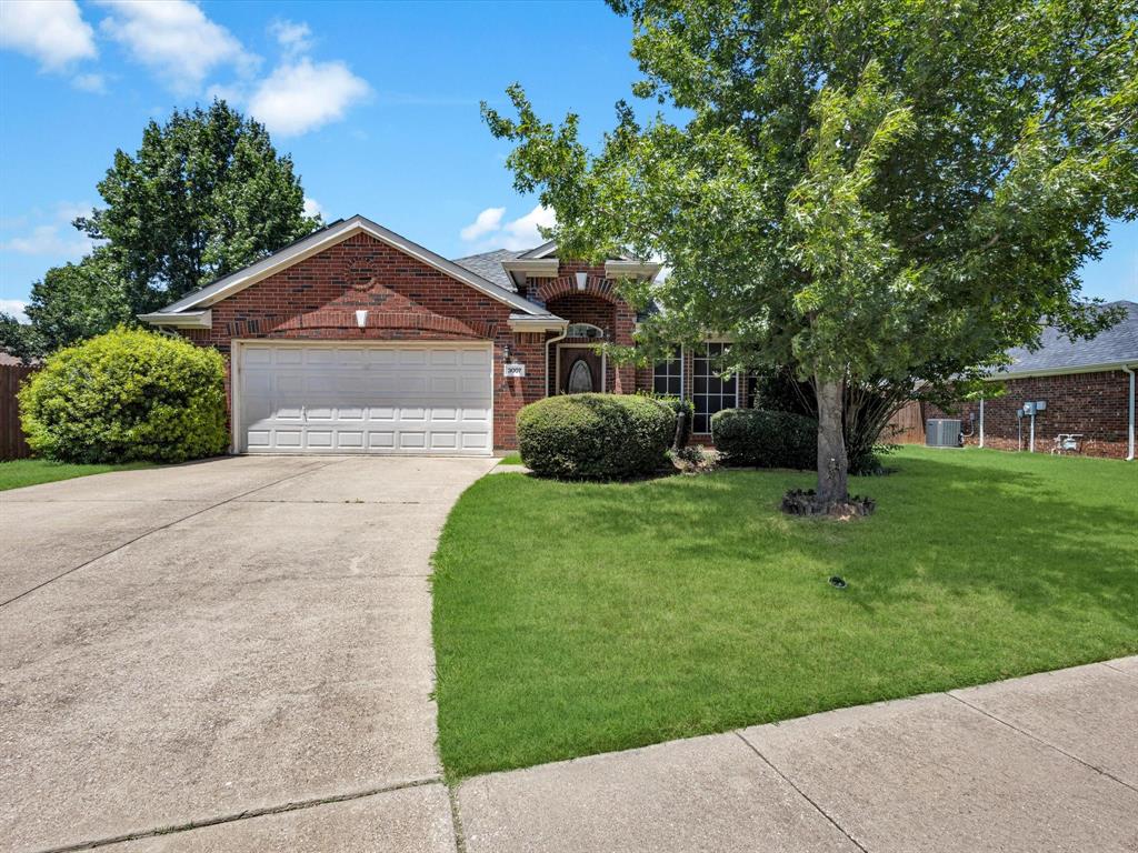 3007 Norwich Lane Corinth, TX 76210 - Photo 1 of 1 front view of a house with a yard