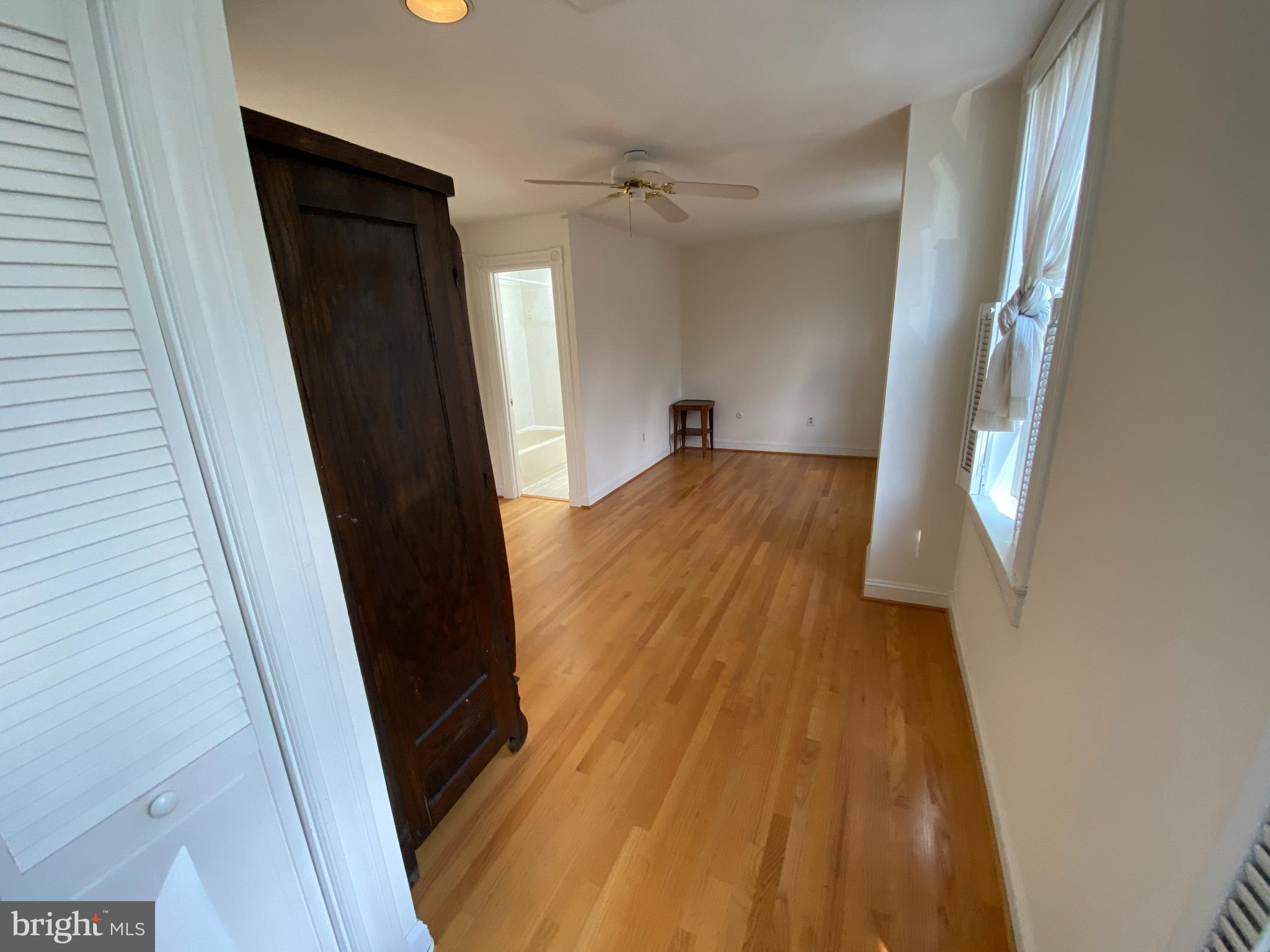 600 Acker Place Northeast Washington, DC 20002 - Photo 11 of 17 a view of front door and wooden floor