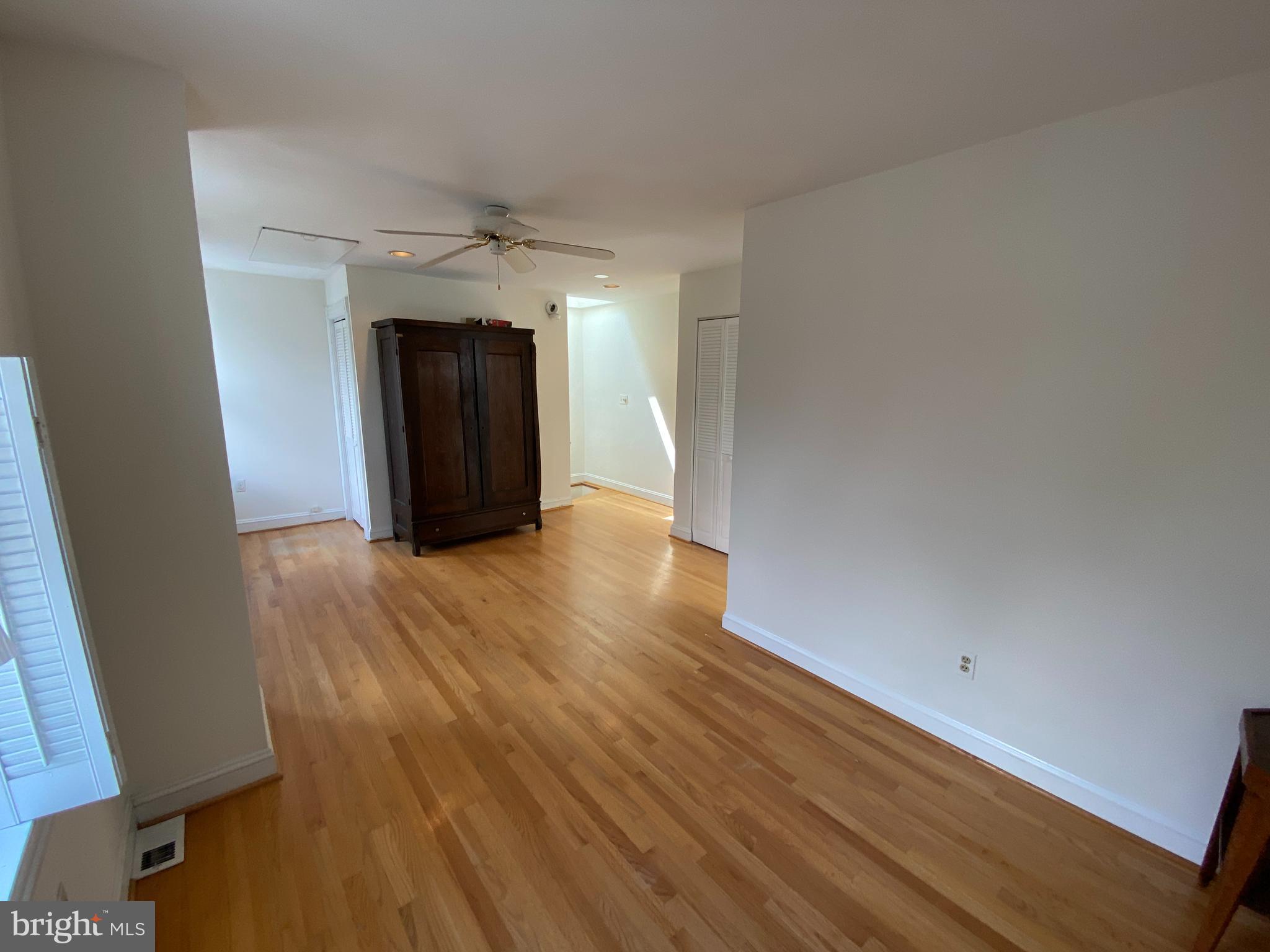 600 Acker Place Northeast Washington, DC 20002 - Photo 12 of 17 wooden floor in an empty room with a window