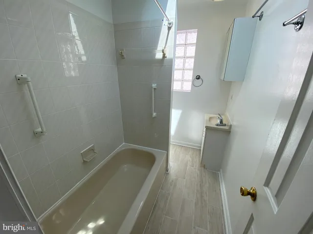 a bathroom with a bathtub