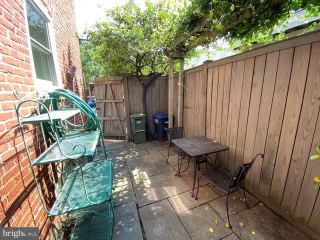 a view of a chairs in patio