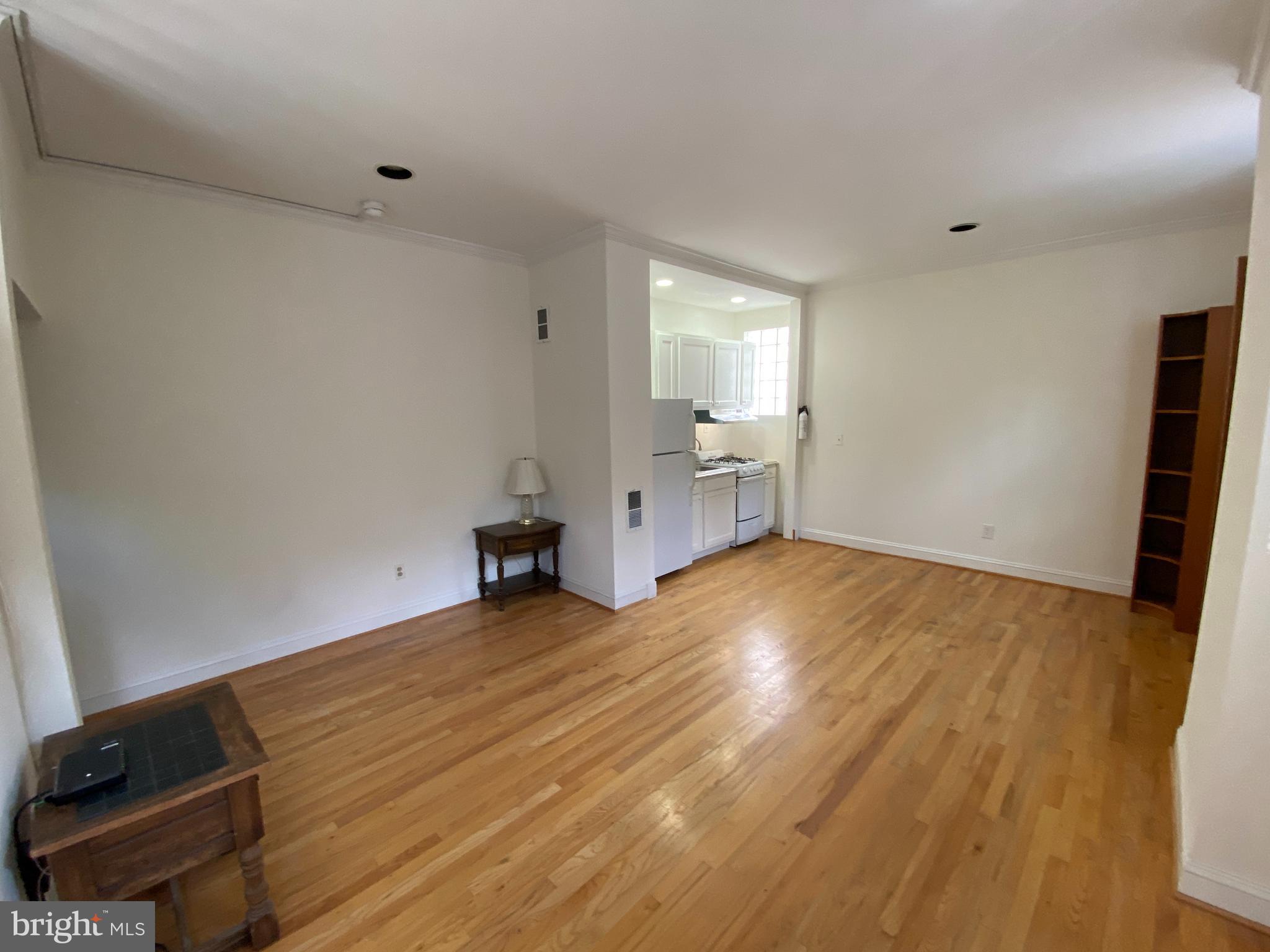 600 Acker Place Northeast Washington, DC 20002 - Photo 6 of 17 a view of empty room with wooden floor