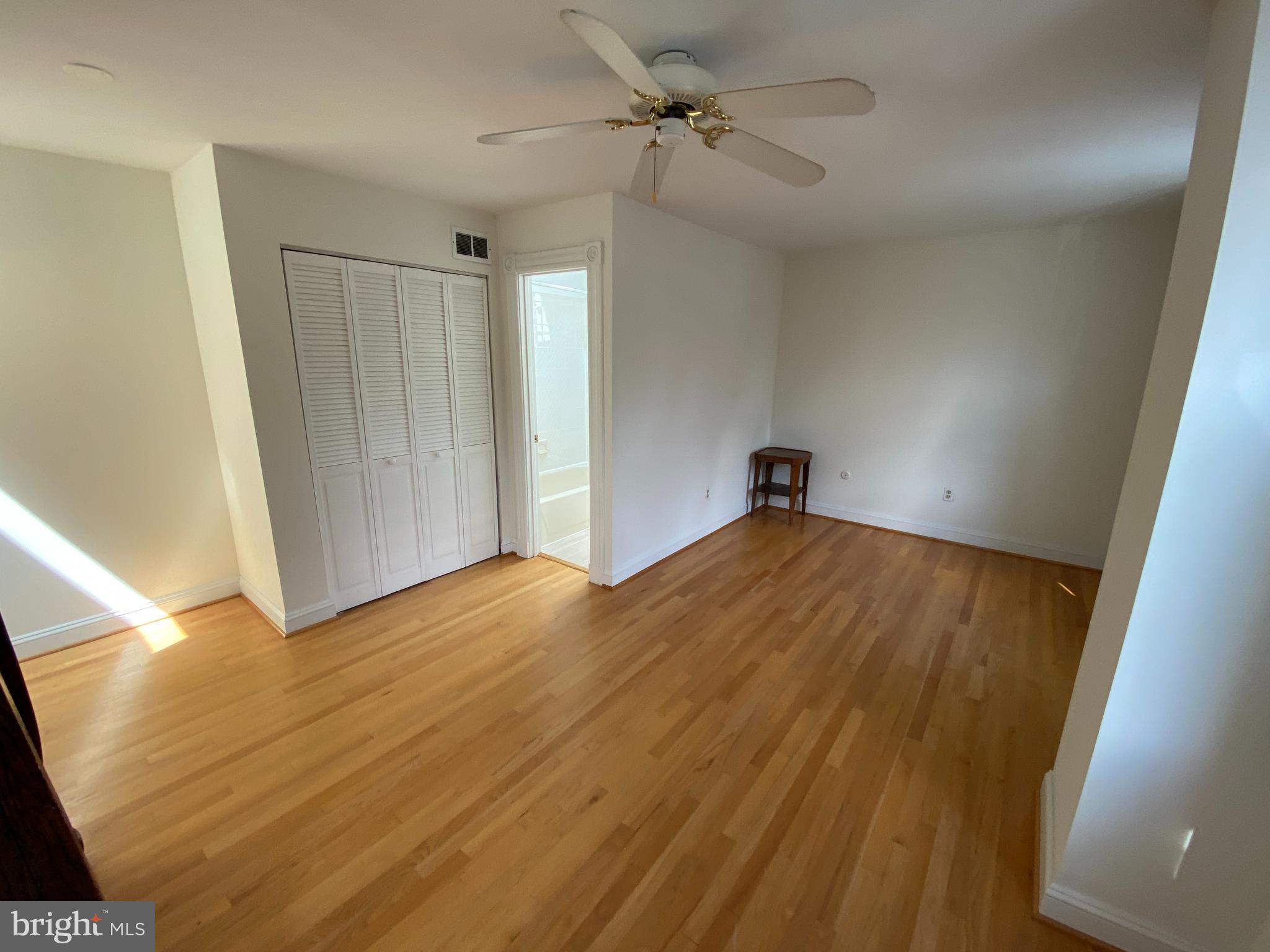 600 Acker Place Northeast Washington, DC 20002 - Photo 10 of 17 a view of empty room with wooden floor