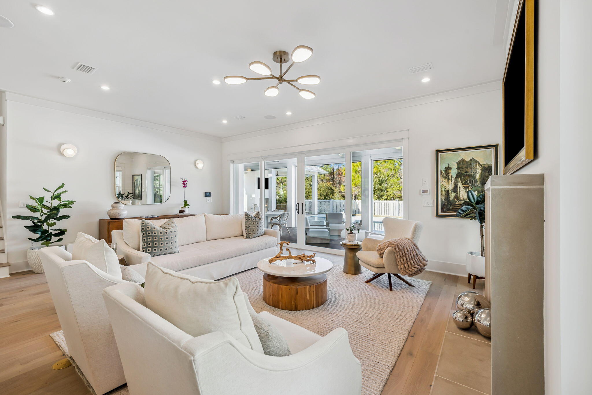 576 Cannonball Lane Watersound, FL 32461 - Photo 13 of 90 a living room with furniture and a flat screen tv