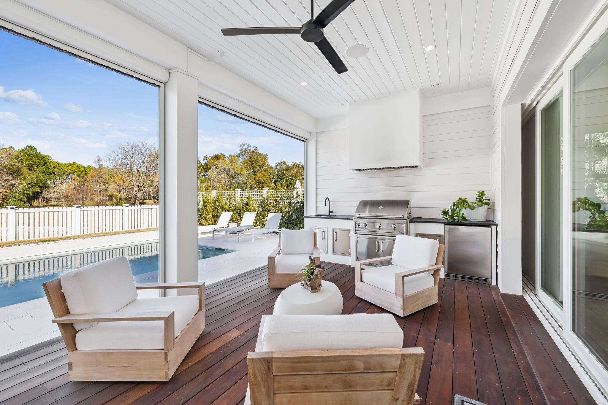 576 Cannonball Lane Watersound, FL 32461 - Photo 17 of 90 a living room with furniture and a large window