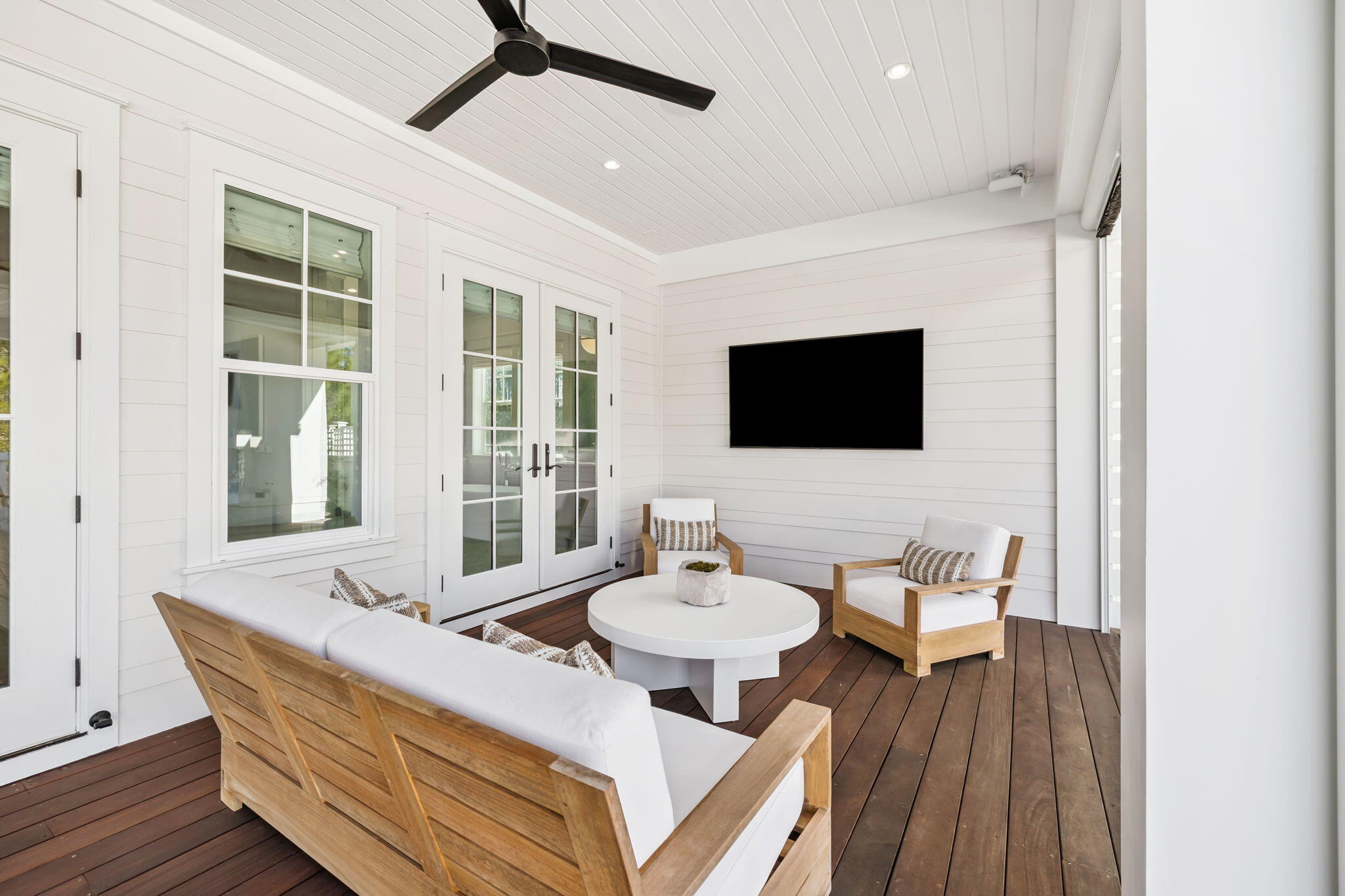 576 Cannonball Lane Watersound, FL 32461 - Photo 22 of 90 a living room with furniture and a flat screen tv