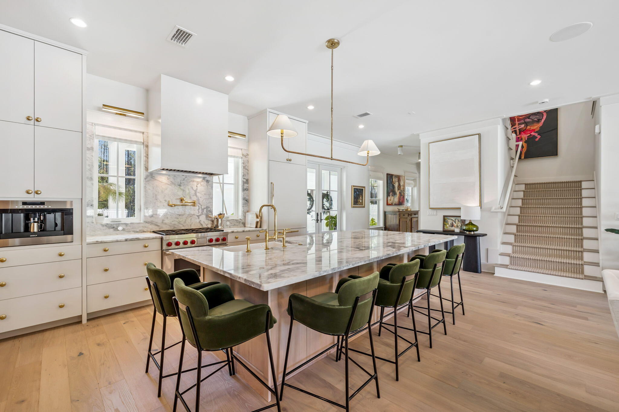 576 Cannonball Lane Watersound, FL 32461 - Photo 3 of 90 a large kitchen with a table and chairs