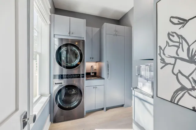 a view of a swimming pool with a patio and a yard