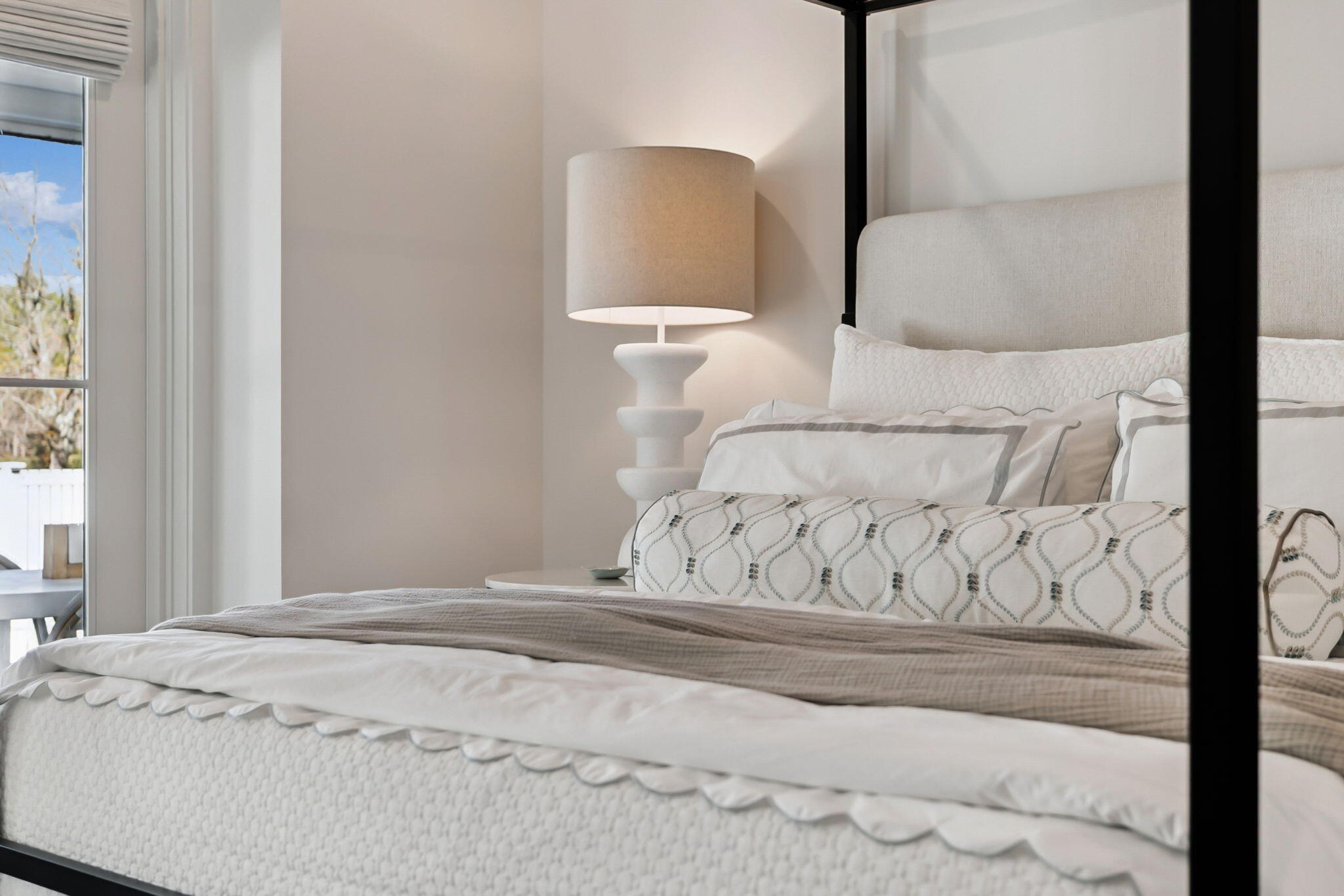 576 Cannonball Lane Watersound, FL 32461 - Photo 36 of 90 a bed with white sheets and pillows on it