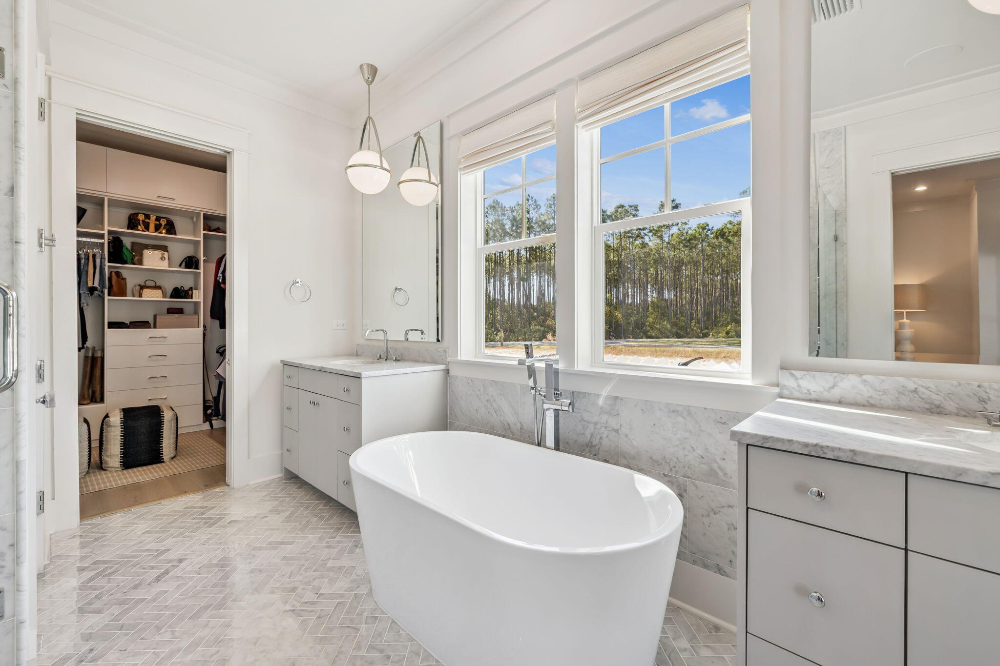 576 Cannonball Lane Watersound, FL 32461 - Photo 41 of 90 a white bath tub sitting next to a bathroom sink
