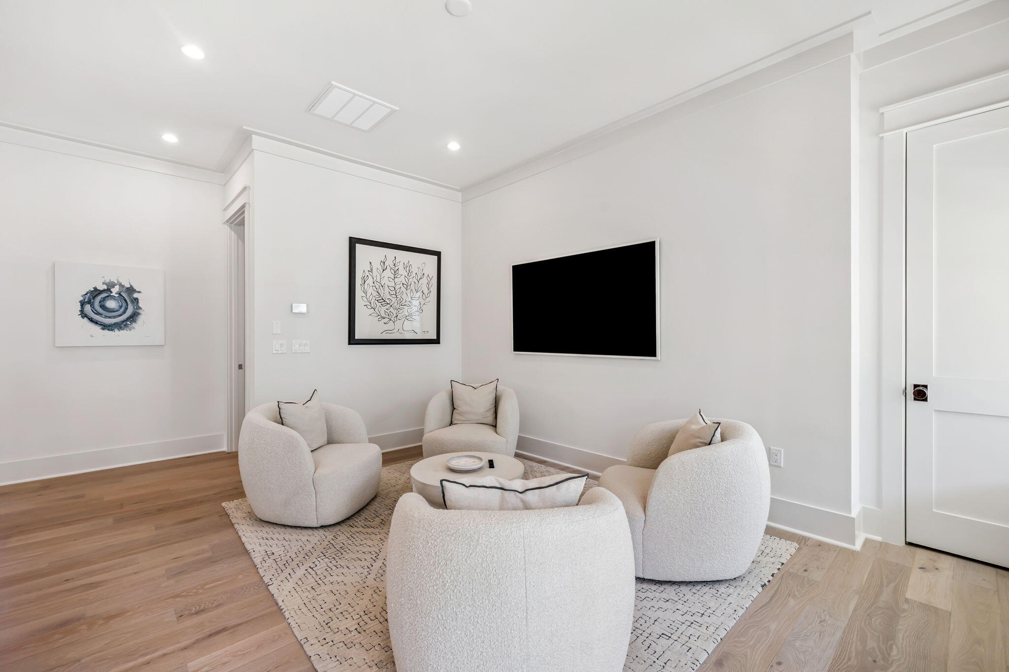576 Cannonball Lane Watersound, FL 32461 - Photo 46 of 90 a living room with furniture and a flat screen tv