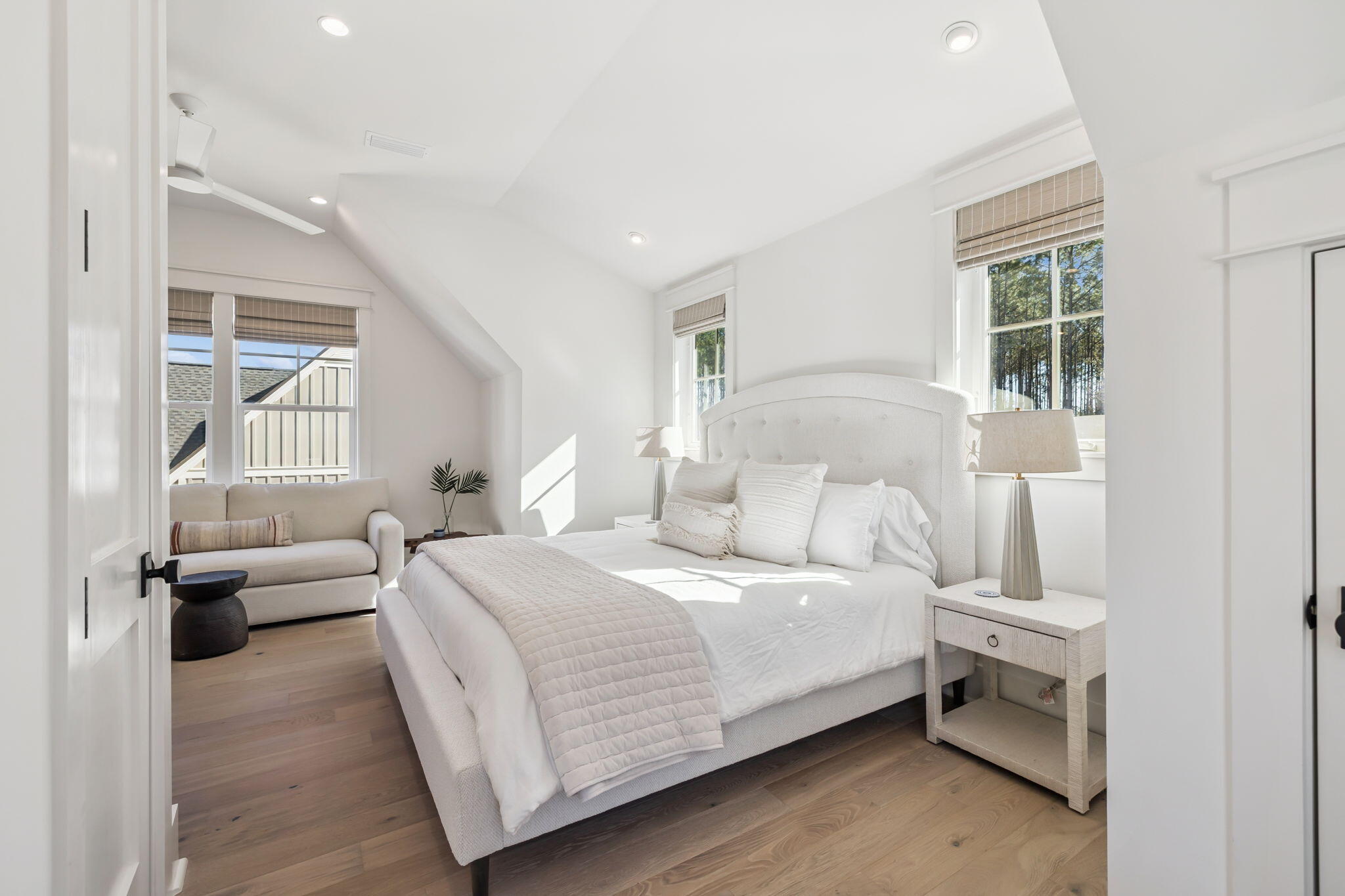 576 Cannonball Lane Watersound, FL 32461 - Photo 54 of 90 a bedroom with a bed and a large window