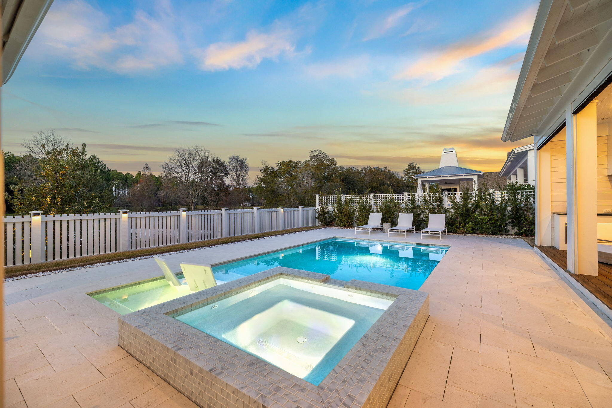 576 Cannonball Lane Watersound, FL 32461 - Photo 73 of 90 a view of a swimming pool with a patio and a yard