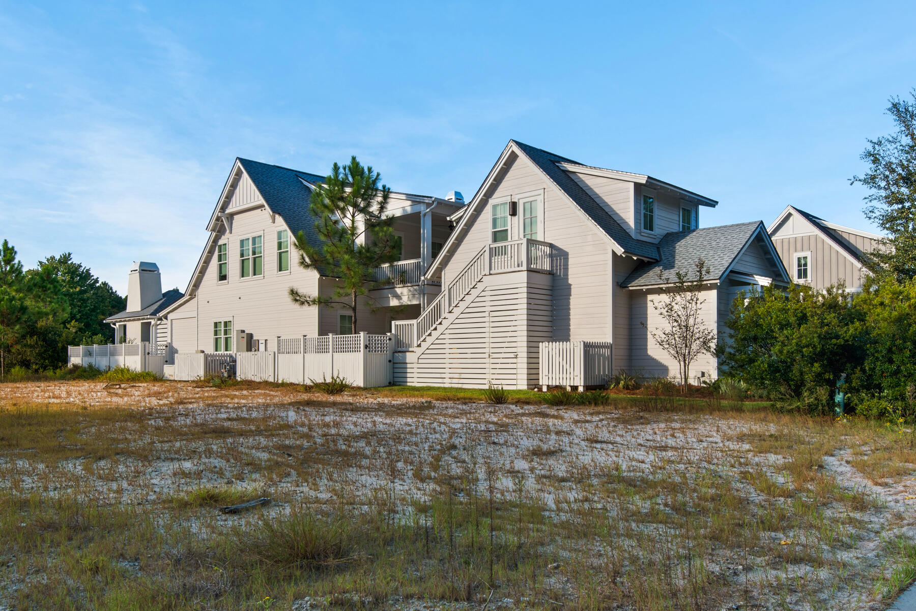 576 Cannonball Lane Watersound, FL 32461 - Photo 76 of 90 a front view of a house with a yard