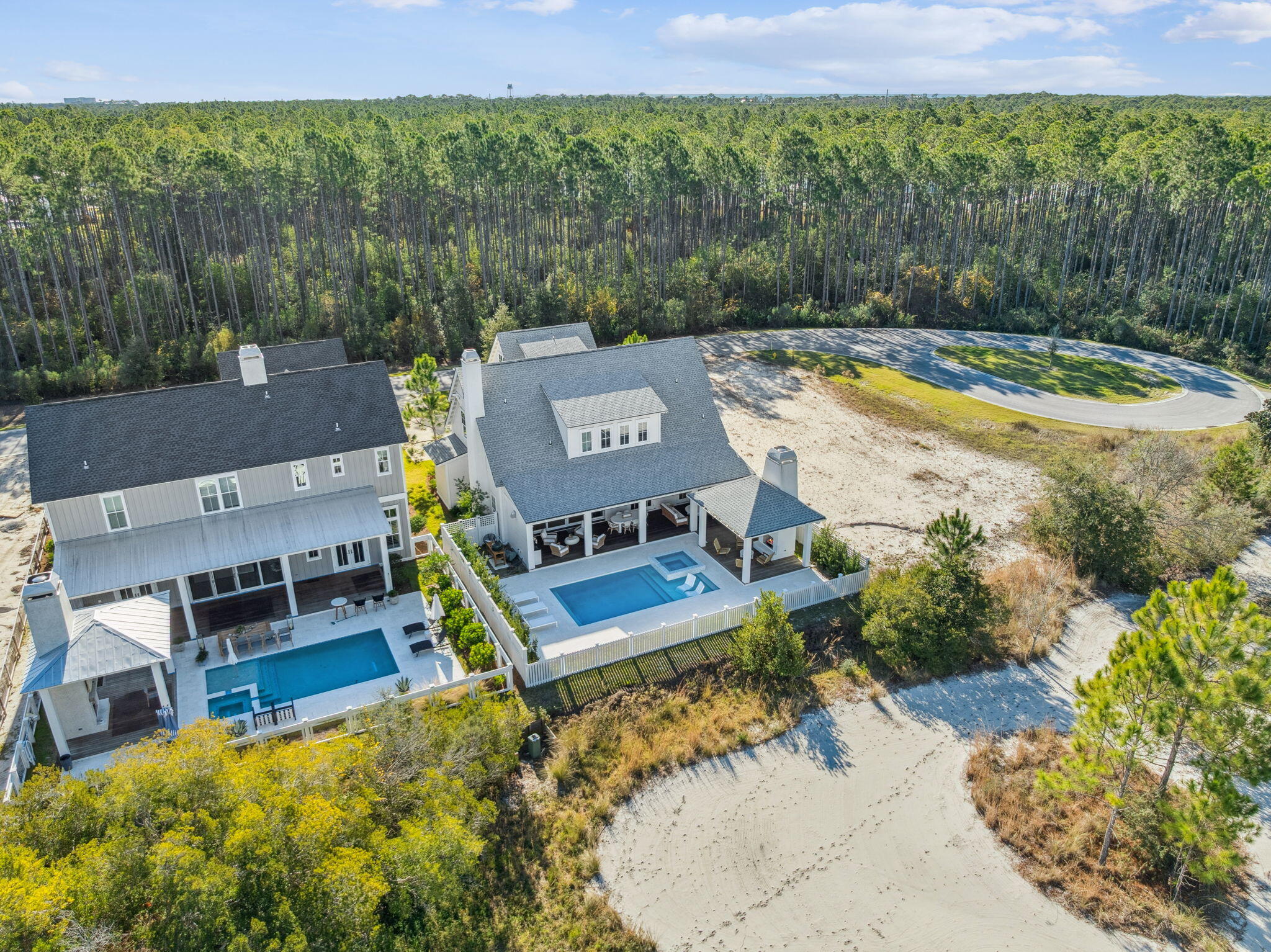 576 Cannonball Lane Watersound, FL 32461 - Photo 78 of 90 swimming pool with outdoor seating and trees