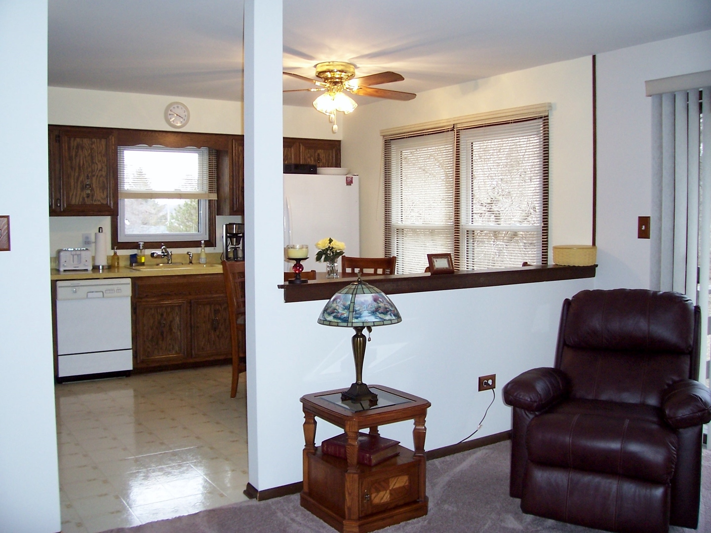 411 Lemont Street Lemont, IL 60439 - Photo 12 of 31 a view of a livingroom with furniture and a window