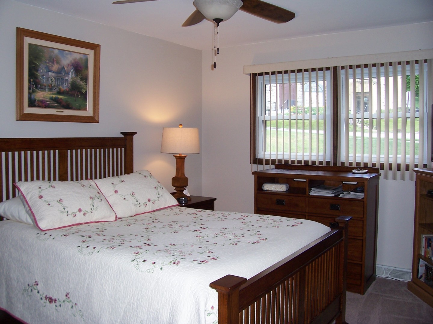 411 Lemont Street Lemont, IL 60439 - Photo 15 of 31 a bed sitting in a bedroom next to a window