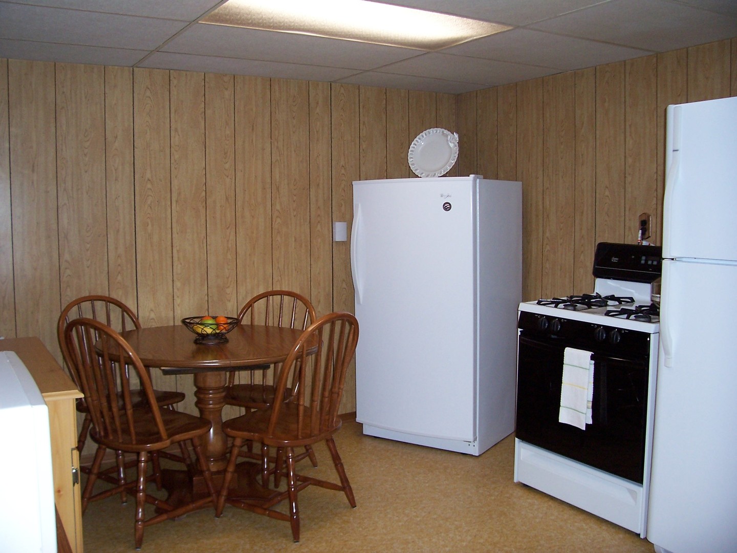 411 Lemont Street Lemont, IL 60439 - Photo 26 of 31 a dining room with furniture and wooden floor