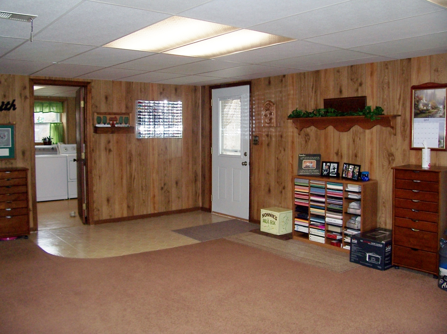 411 Lemont Street Lemont, IL 60439 - Photo 30 of 31 a view of an empty room with furniture and a window