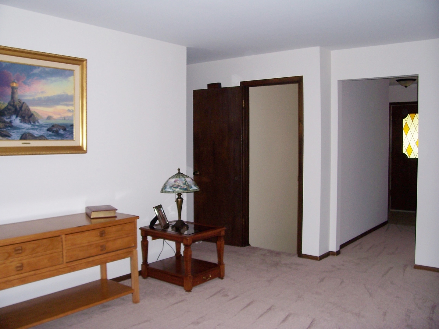 411 Lemont Street Lemont, IL 60439 - Photo 10 of 31 a bedroom with furniture and a window