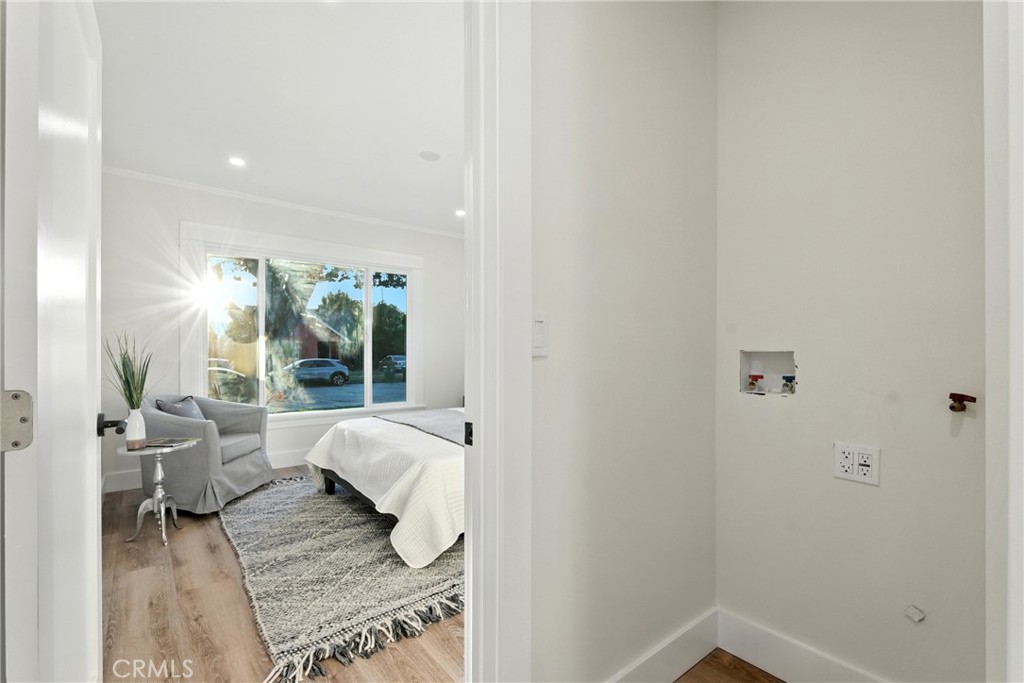 4340 2nd Avenue Los Angeles, CA 90008 - Photo 21 of 54 a living room with furniture and a large window
