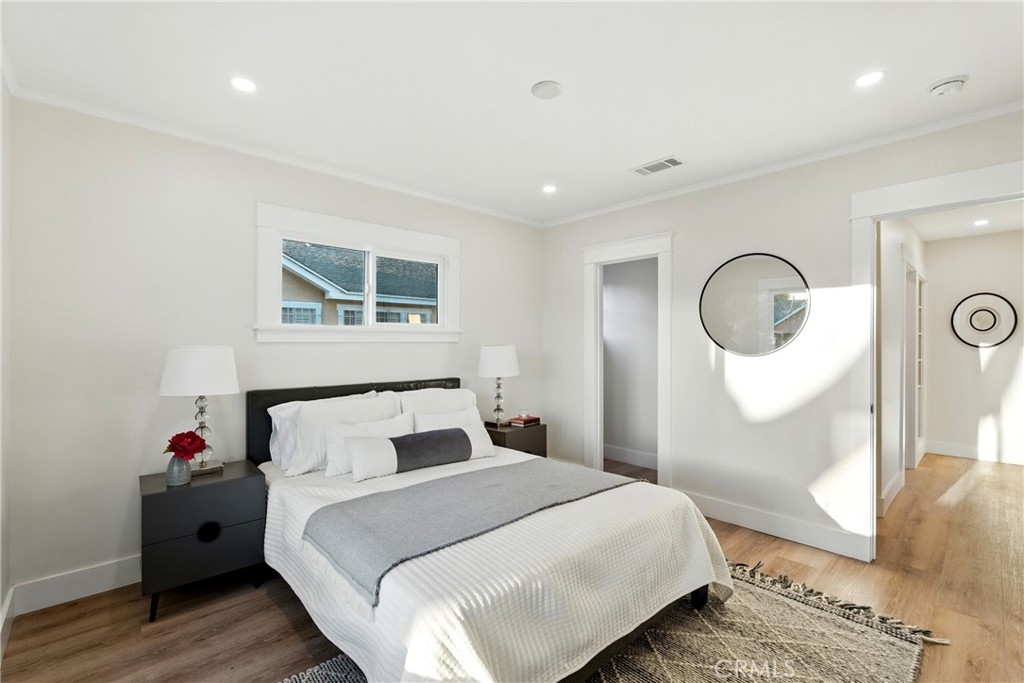 4340 2nd Avenue Los Angeles, CA 90008 - Photo 23 of 54 a bedroom with a bed and a dresser