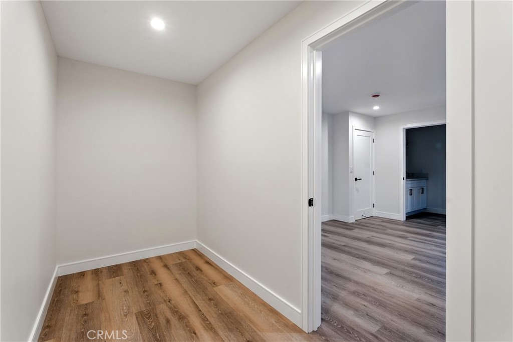 4340 2nd Avenue Los Angeles, CA 90008 - Photo 44 of 54 a view of a room with wooden floor and a bathroom