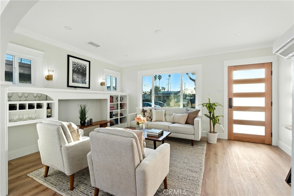 4340 2nd Avenue Los Angeles, CA 90008 - Photo 5 of 54 a living room with furniture and a large window