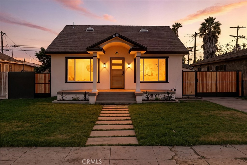 4340 2nd Avenue Los Angeles, CA 90008 - Photo 52 of 54 a front view of a house with a garden