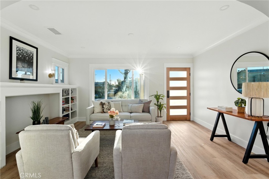 4340 2nd Avenue Los Angeles, CA 90008 - Photo 6 of 54 a living room with furniture and a wooden floor