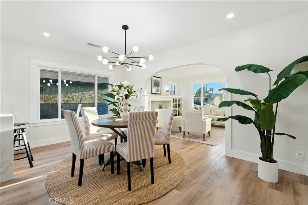 4340 2nd Avenue Los Angeles, CA 90008 - Photo 7 of 54 a view of a dining room with furniture window and wooden floor