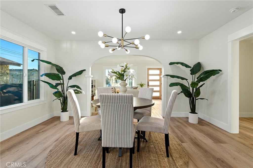 4340 2nd Avenue Los Angeles, CA 90008 - Photo 8 of 54 a view of a dining room with furniture window and wooden floor