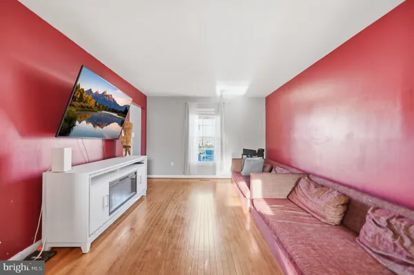a view of a living room with a flat screen tv