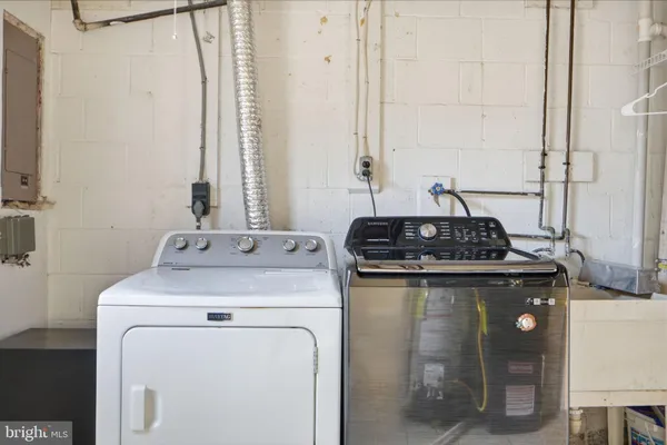 a kitchen with a stove and a sink