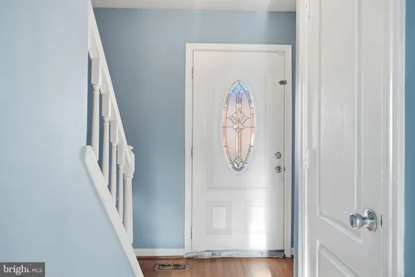 a view of front door with hallway