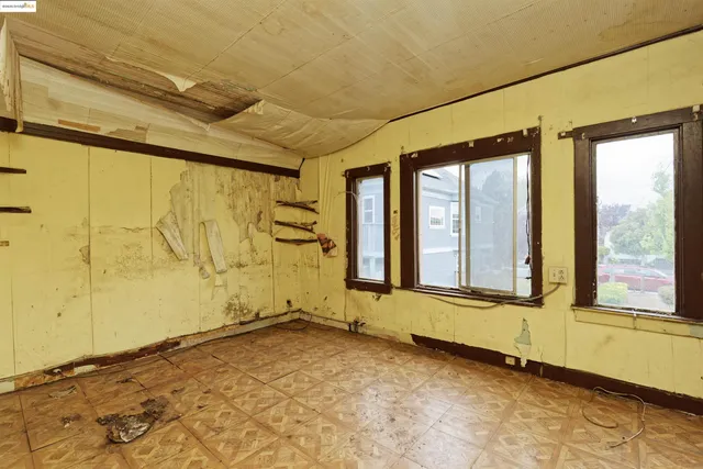 a view of a room with a large window