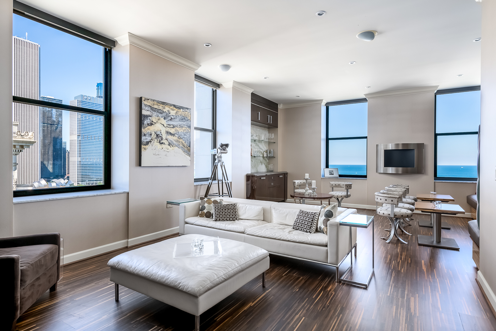 310 South Michigan Avenue, Unit 1900 Chicago, IL 60604 - Photo 4 of 29 a living room with furniture and wooden floor