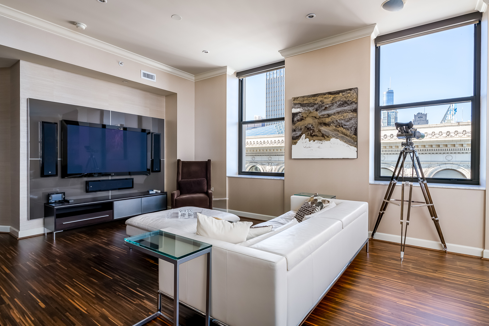 310 South Michigan Avenue, Unit 1900 Chicago, IL 60604 - Photo 5 of 29 a living room with a couch and a table