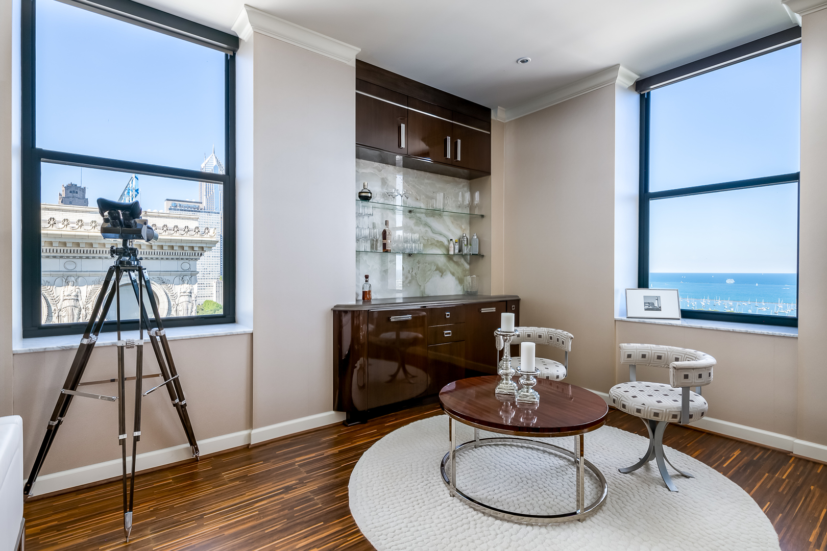 310 South Michigan Avenue, Unit 1900 Chicago, IL 60604 - Photo 7 of 29 a living room with furniture and a wooden floor