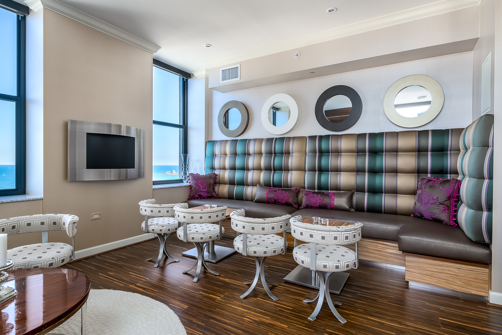 310 South Michigan Avenue, Unit 1900 Chicago, IL 60604 - Photo 8 of 29 a living room with furniture and a flat screen tv