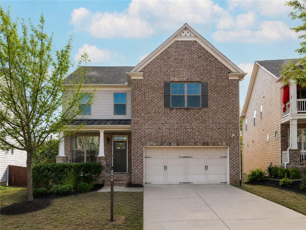 5914 High Hampton Lane Mableton, GA 30126 - Photo 1 of 32 a front view of a house with garage