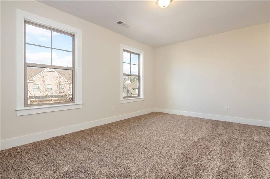 5914 High Hampton Lane Mableton, GA 30126 - Photo 25 of 32 an empty room with windows