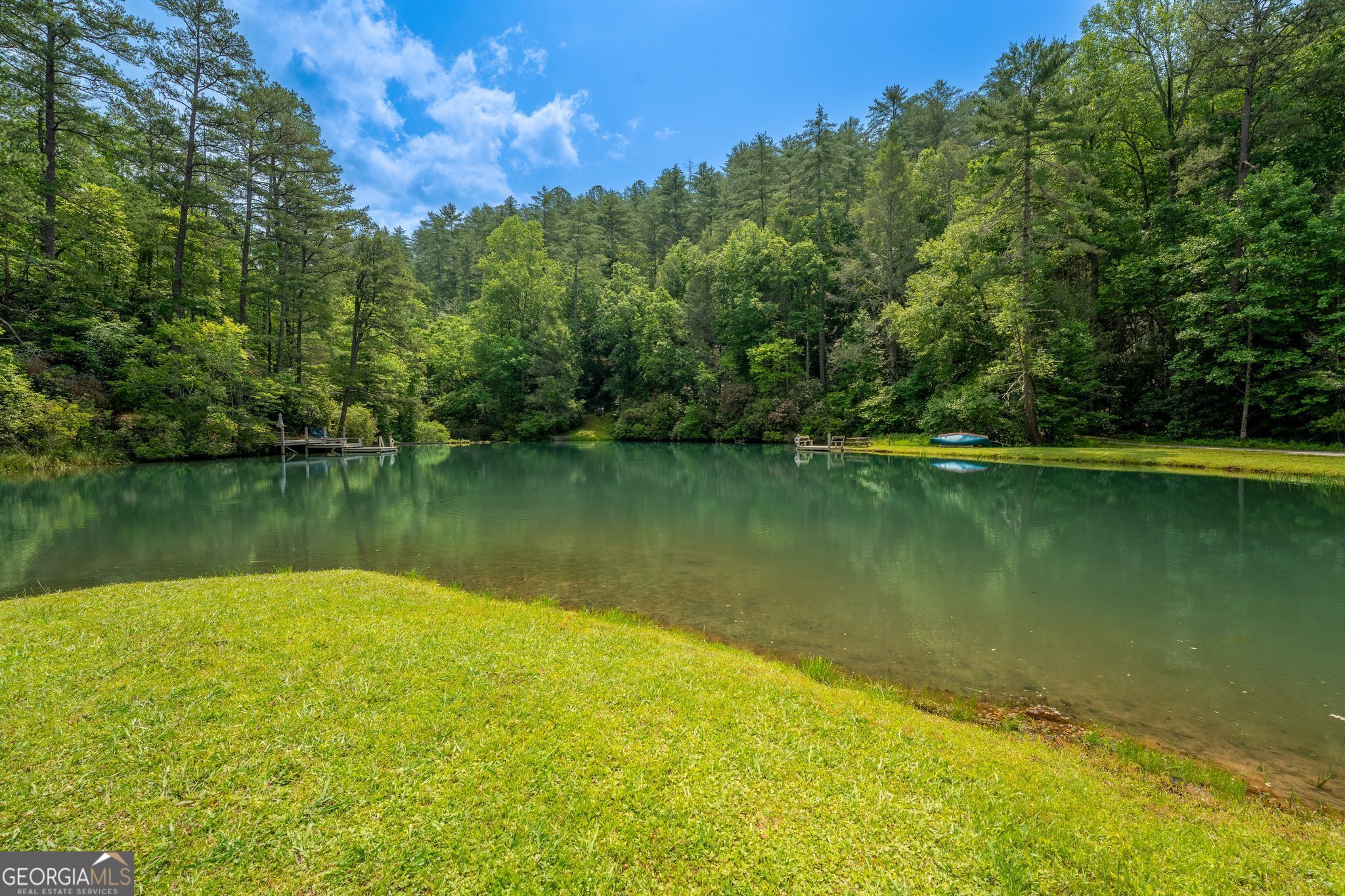 0 Grizzly Ridge Road Lakemont, GA 30552 - Photo 14 of 75 a view of a lake with a city
